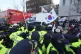 Supporters of impeached South Korean President Yoon Suk reac