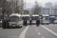 Police buses are gathered near the presidential residence in