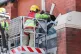 Merseyside Fire & Rescue service help repair a broken window