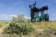 A Spanish fighting bull billboard, is painted with the colou