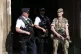 PROTECTING THEIR OWN: Armed guard outside Parliament followi