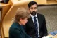 Then Health Secretary Humza Yousaf listens as First Minister