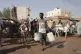 People gather to collect water in Khartoum, Sudan, on May 28