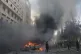 A car burns after an air strike next to a hospital in Idlib,