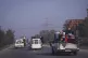 Residents leave the city carrying their belongings in Hama, 