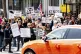 
Protesters rally against Tesla CEO Elon Musk outside a Tesl