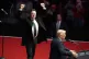 Elon Musk reacts as President-elect Donald Trump speaks at a