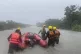 Firefighters on their way to evacuate local residents during