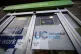 A Universal Credit sign on the door of a job centre plus in 