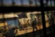 Volunteer welders work on metal pieces at a facility produci