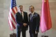 U.S. Secretary of State Antony Blinken (left) shakes hands w