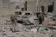 A Yemeni inspects the damage reportedly caused by U.S. airst