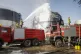 Firefighters work at the scene of an Israeli airstrike on th