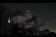 In this image made from video footage, smoke rises after a b