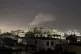 Smoke rises from a location reportedly struck by US air stri