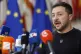 Ukraine's President Volodymyr Zelenskyy talks to journalists