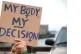 (L to R) The message is loud and clear; supporter Megan Rapi