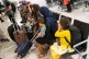 Refugees from Afghanistan wait to be processed after arrivin