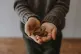 Child holding pocket money change 