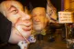 Demonstrators wear masks of Israel's Prime Minister Benjamin