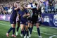 Seattle Reign forward Emeri Adames celebrates with teammates