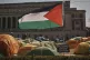 The Palestinian flag flies over the protest camp on the lawn