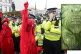 Police and demonstrators with a bus parked on London Bridge