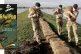 DIFFERENT BATTLEFIELD: British Army soldiers reinforce an em