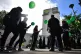 People release balloons at the Grenfell Memorial Community M