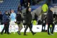 Manchester City manager Pep Guardiola gestures towards the f