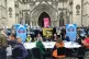 Activists outside the Royal Courts of Justice in London take