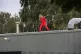 A Palestine Action activist on the roof of a US-owned weapon