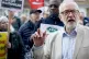 BLOODIED BUT UNBOWED: Jeremy Corbyn joins protesters outside