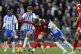 Liverpool's Conor Bradley (centre) and Brighton & Hove Albio