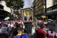 A supporter holds a framed image of President Nicolas Maduro