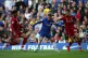Eden Hazard holds off Liverpool's Joe Gomez and Trent Alexan