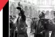SOLIDARITY IN ACTION: Alan Lomax (with microphone) and Hamis