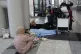 Passengers wait at the departure terminal ground of Rafik Ha