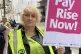 LOUD AND CLEAR: PCS picket Angela Grant outside the HQ of th