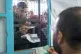 FACING ANNIHILATION: Palestinians line up to receive the lit
