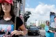 CONTRASTING PERSPECTIVES: A woman wearing a Trump t-shirt wa