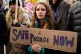 People take part in a protest outside Downing Street in West