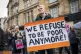 RMT strike placard reading We Refuse to be Poor Anymore at a