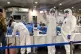 Russian medical experts prepare to check passengers arriving
