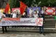 John (third from left, fist raised) at a protest in solidari