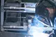 A welder at work in Bosch Thermotechnology in Clay Cross, Ch