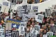 Anti-war demonstrators make their way down Piccadilly in cen