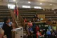 Miriam Amancay Colque holds the Wiphala as she addresses the
