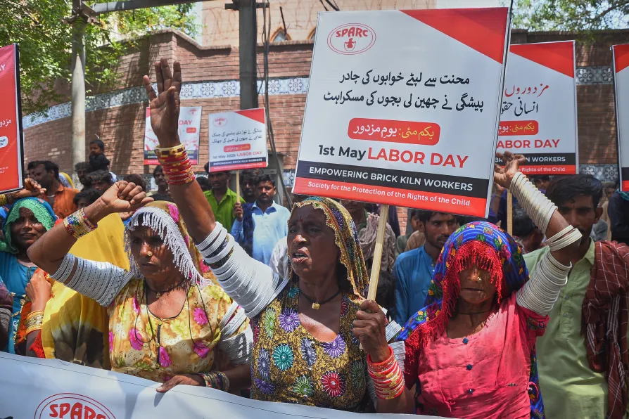 Kiln workers take part in a demonstration to mark May Day in Hyderabad, Pakistan, Friday, May 1, 2026