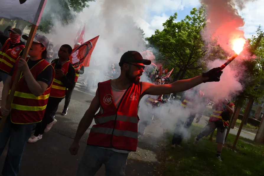 Protesters march during the May Day demonstration in Rennes, western France, Friday, May 1, 2026
